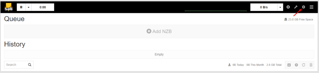 The SABnzbd main page with a red arrow pointing to the gear icon.